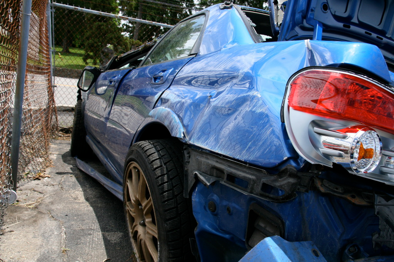 Illustration for article titled Subaru STI Hits Two Trees At Speed, Flips Twice, Everyone Survives!